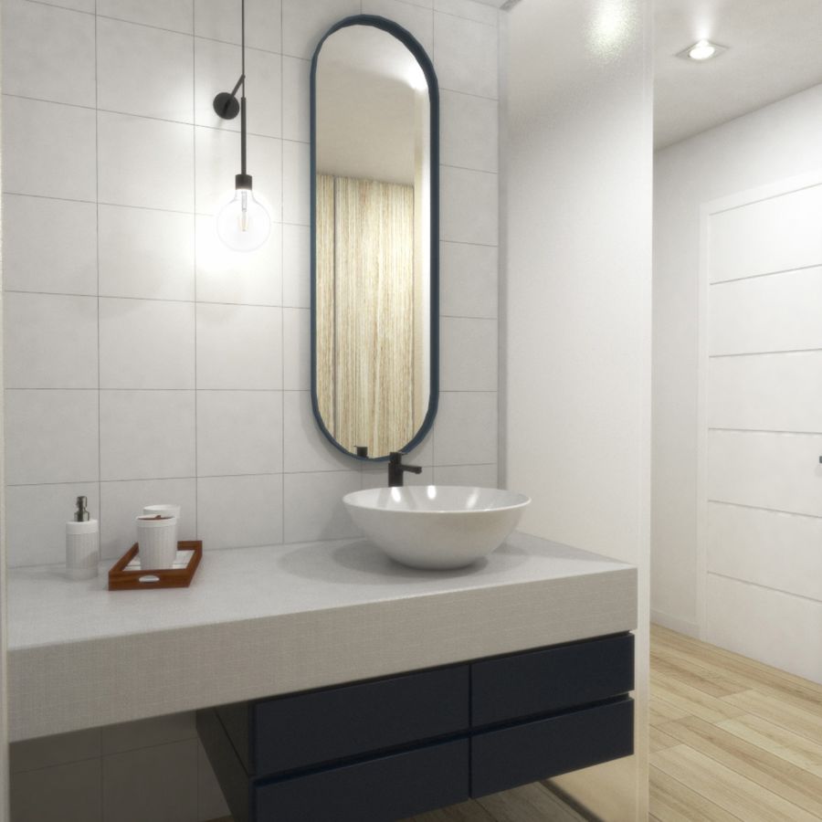 Detalle baño con espejo ovalado