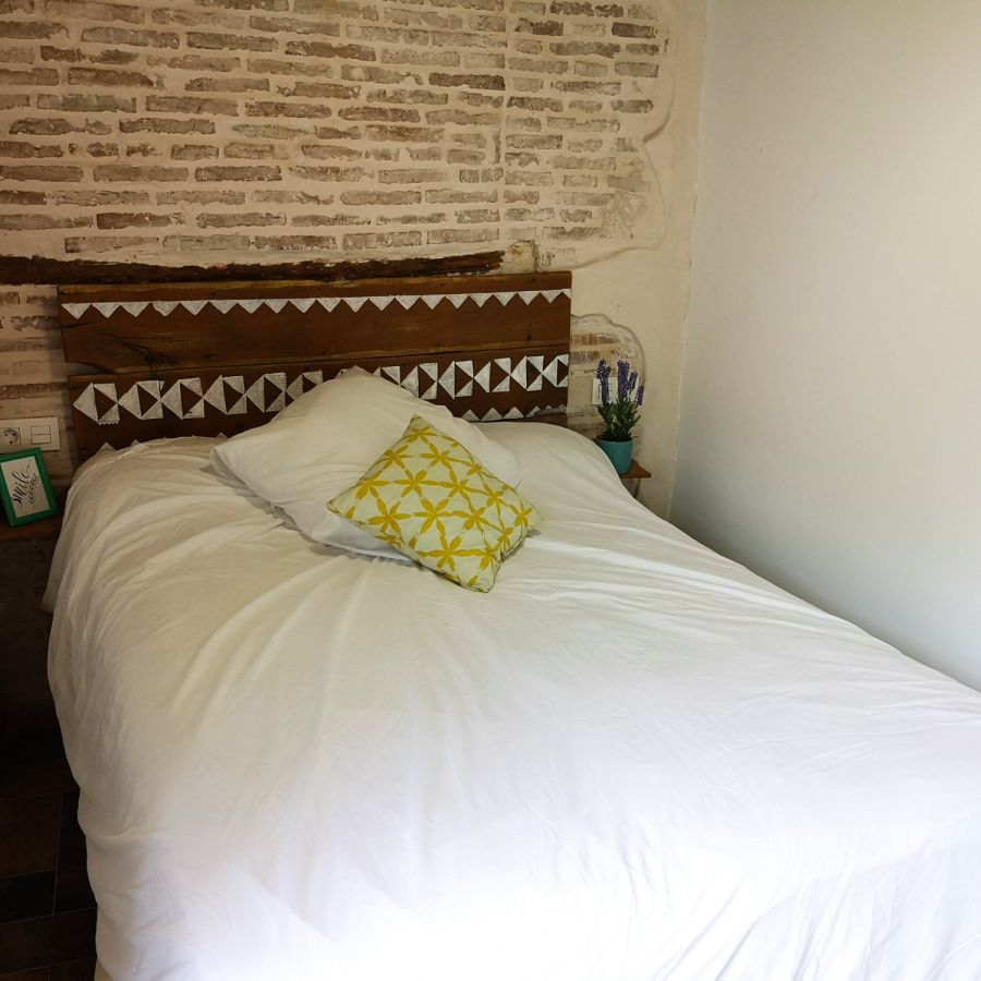 Reforma de apartamento con recuperación de techos de madera 10